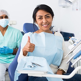 Patient Concord smiling after dental checkup